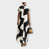 Adéla – Elegantní Dlouhé Šaty s Moderním Designem a Nadčasovou Elegancí